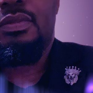 King Klaude lapel pin.